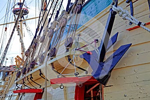 Masts and rigging of an old wooden sailboat. Details deck of the ship