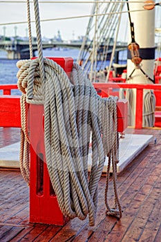 Masts and rigging of an old wooden sailboat. Details deck of the ship