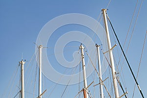 Masts tops and rope rigging accessory on yachts sailing vessels in the marina