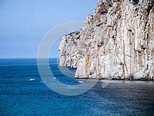 Masuas sea stack daily and some boats in summertime (Sardinia-I