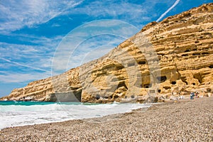 Matala, beautiful beach on Crete island, waves and rocks.