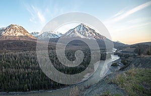 Matanuska River flowing past snowcapped Chugach Mountains near Palmer Alaska USA