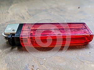 portrait of a used red lighter photo