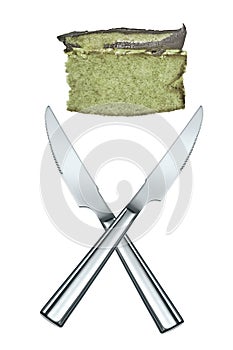 Matcha cake slice with knives crossed