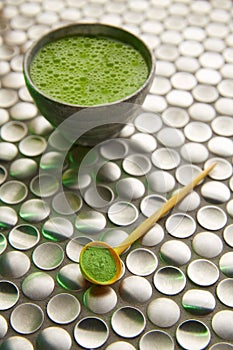 Matcha green tea from Japan on stainless steel