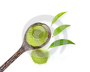 Matcha green tea powder in wood spoon isolated on white background.