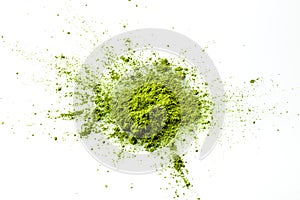 Matcha powder explosion on white background.