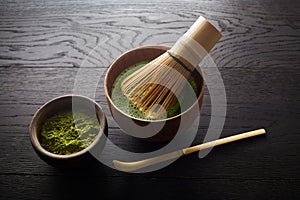 Matcha powder. Organic green matcha tea ceremony. Healthy drink. Traditional japanese drink on white background