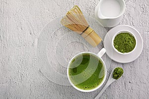 Matcha powder. Organic green matcha tea ceremony. Healthy drink. Traditional japanese drink on white background