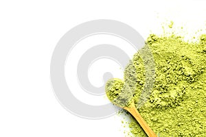 matcha tea green powder with a wooden spoon on a white background with place for text. Prescription antioxidant mask
