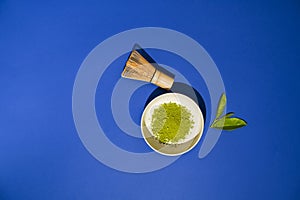 Matcha tea. A traditional oriental drink for health and energy. Powdered green tea and whisk. Photos are sharp in