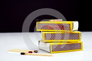 Matches with burnt and fresh match sticks