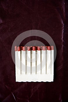 Matches on deep red background
