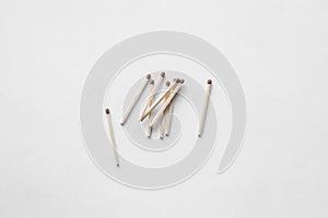 matches are scattered on the table. match on a white background