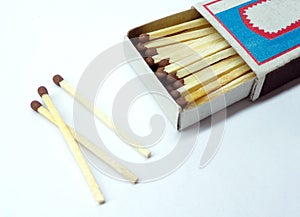 Matches on a white background close-up. Box of matches. Matches made of wood and sulfur.