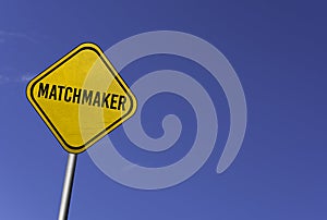 matchmaker - yellow sign with blue sky background