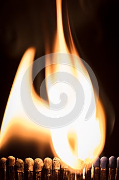 Matchsticks with black background, flames and fire