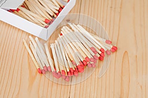 Matchsticks and box over wooden