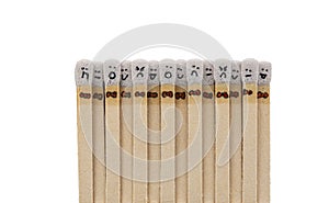 matchsticks with faces painted on the heads