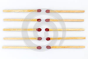 Matchsticks are organized on white background.