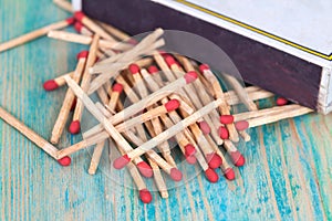 Matchsticks over wooden