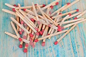 Matchsticks over wooden background