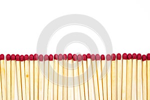 Matchsticks row on a white background