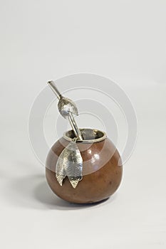 Mate gourd with alpaca silver decorations and bombilla photo