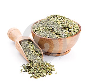 Mate tea in a wooden bowl isolated on white