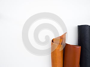 Material from black brown and light brown leather with white iso