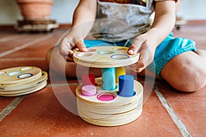A material of montessori pedagogy, a new style of teaching children in schools around the world, with wooden educational toys photo
