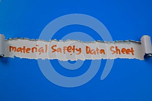 Material Safety Data Sheet Text written in torn paper
