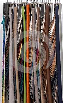Material samples hanging on a wall