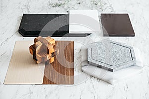 Material Selections including Granite tile, Marble tile, Acoustic tile, Walnut and Ash Wood Laminate with plant.