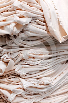 Material on the textile factory. Cloth clothing texture material textile pattern background.