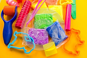 Material and tools for modeling clay. Creative lesson for a child
