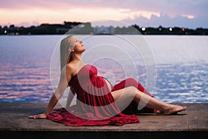 Maternity Portrait of a Woman Wearing Red