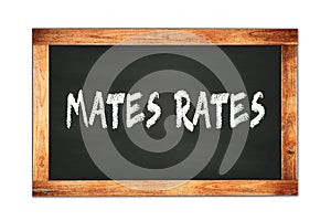 MATES  RATES text written on wooden frame school blackboard