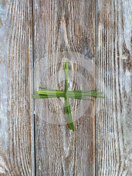 Mathematical figures made of natural material, grass and flowers.