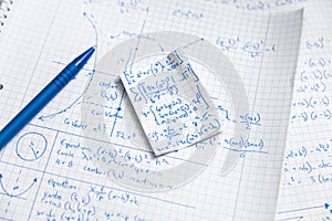 Math exercize in white notebook closeup