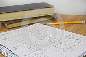 Math Homework with Pencil and Books