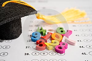 Math Number colorful  with graduation hat and pencil on Answer sheet background, Education study mathematics learning teach