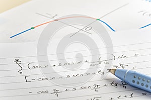 Mathematical Equations on Lined Paper photo