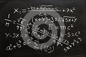 mathematical equations written on a blackboard