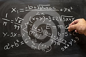 mathematical equations written on a blackboard