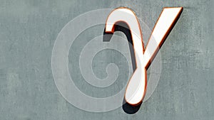 Large letter gamma on a grey background photo