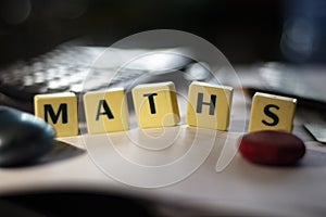 Homework with wording ` MATHS ` with selective blur and close up view