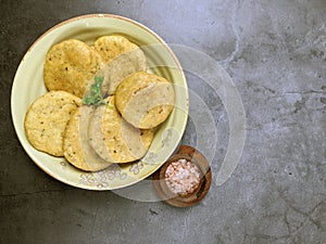Mathri, an Indian snack made of  whole wheat flour or all purpose flour with fenugreek leaves and Carom seeds photo