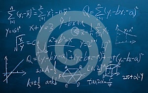 Maths formulas on chalkboard background photo