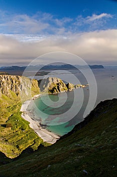 Matinden summit view on nearby beach and cliffs, Vesteralen, Norway